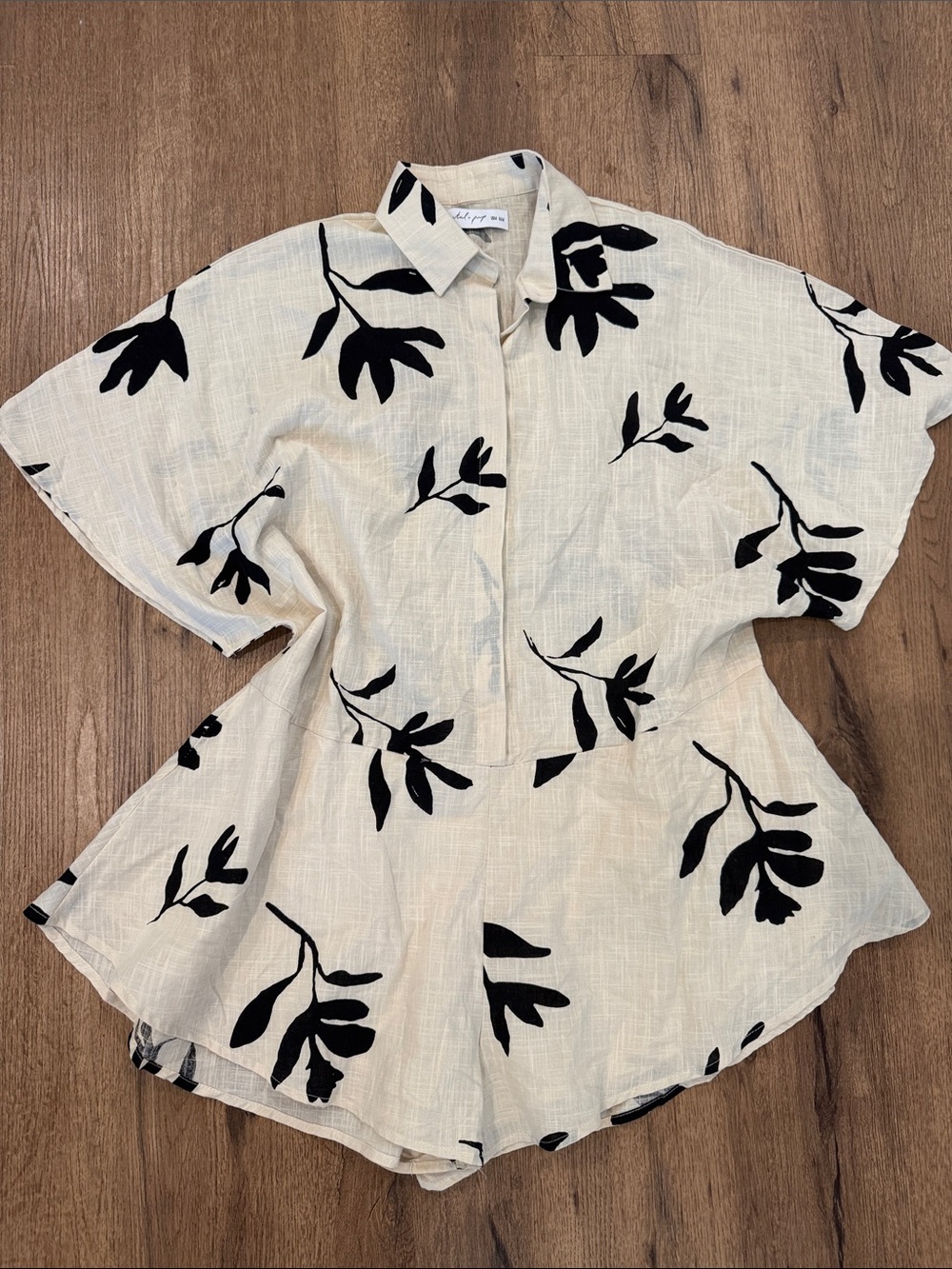 Petal & Pup Cream Short-Sleeve Button Romper with Black Leaf Print